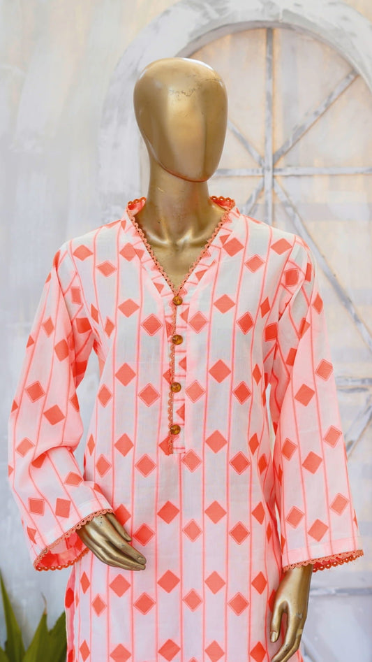 Mannequin wearing a pink patterned outfit with decorative text in the background